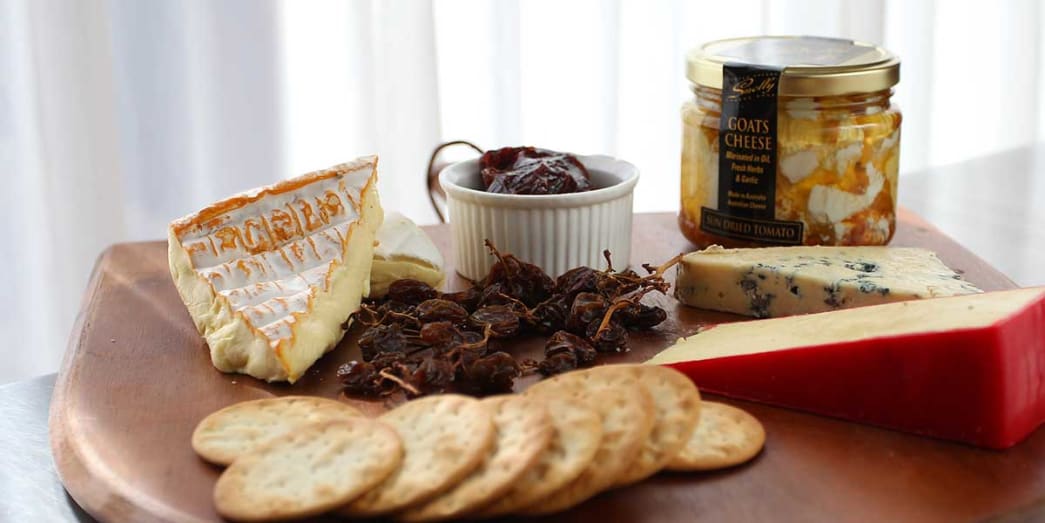 Board of cheeses, breads, and meats at the Smelly Cheese Shop, Hunter Valley New South Wales