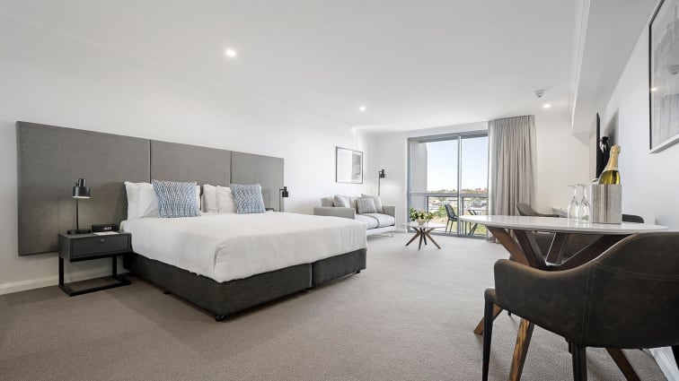 View of Oaks Toowoomba Hotel Bedroom featuring room and view from room.