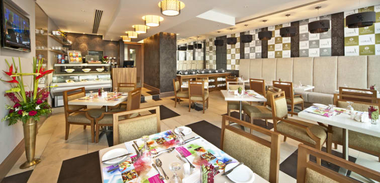 air conditioned cafe with great coffee and vegetarian food options at Oaks Liwa Executive Suites hotel in Abu Dhabi, United Arab Emirates