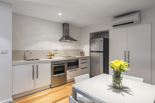 2 bedroom apartment kitchen at oaks lure hotel with wi-fi aircon fridge and stove top
