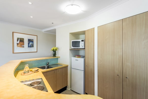2 bedroom hotel apartment kitchen with full size fridge and microwave