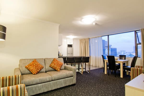 2 bed apartment living room at Oaks Hyde Park Plaza, Sydney CBD