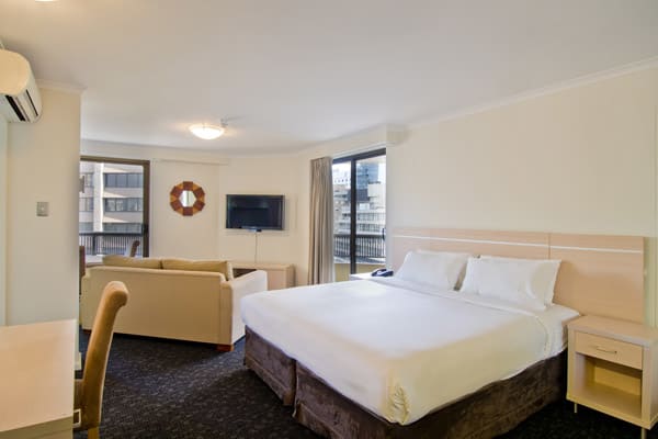 4 star studio room with queen size bed and flat screen tv at Oaks Hyde Park Plaza hotel Sydney