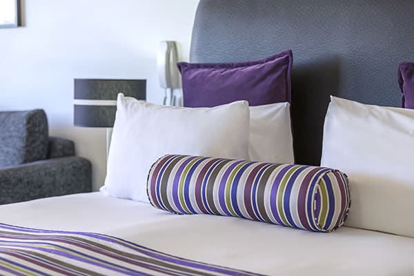 pillows and bed sheet walk at studio executive of oaks hyde park sydney hotel