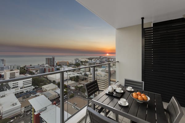 views of spectacular sunrise from balcony of Oaks Elan Darwin 1 bedroom apartment
