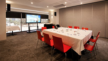 Tolmer meeting room configuration with projector at Oaks Elan Darwin