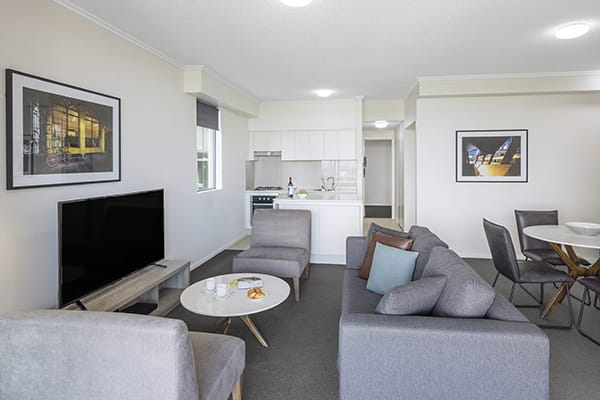 spacious and comfortable living room at 2 Bedroom apartment of Oaks 212 Margaret brisbane hotel