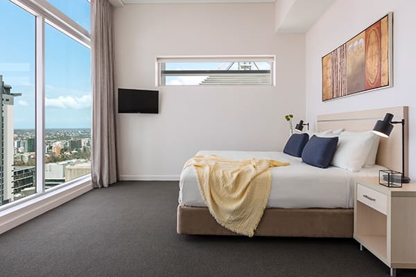 master bedroom in Brisbane serviced apartment 3 bedroom unit at Oaks Casino Towers hotel room facing nice brisbane city view