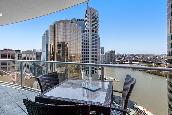Brisbane CBD accommodation with hotel balcony with views of Story Bridge and Brisbane river at Oaks Felix hotel Brisbane city