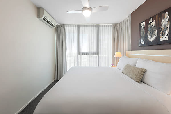 Oaks Brisbane Felix Suites 1 Bed Executive Bedroom with Queen sized Bed and window