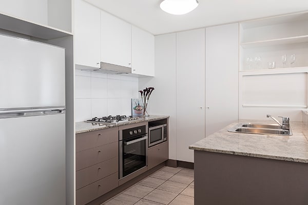 Fully equipped kitchen at Oaks Brisbane on Felix Suites 2 Bedroom Story Bridge View
