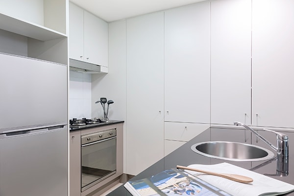 fully equipped kitchen at Oaks Brisbane on Felix Suites 2 Bedroom Story Bridge View 