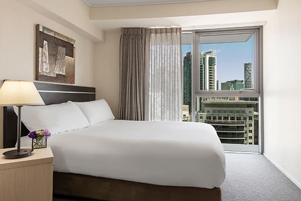 Oaks Brisbane Felix Suites 3 Bed Apartment Bedroom 2 with city view 