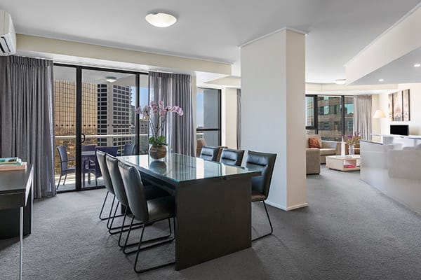 Spacious dining and living room at Oaks Brisbane Felix Suites 3 Bed Apartment