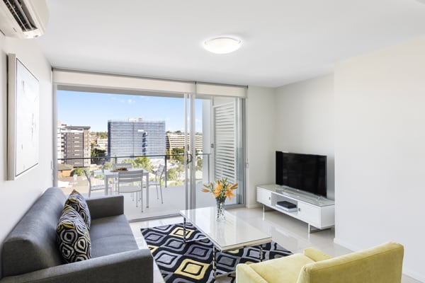 air conditioned 1 bedroom Woolloongabba hotel apartment with television and balcony with views of Brisbane