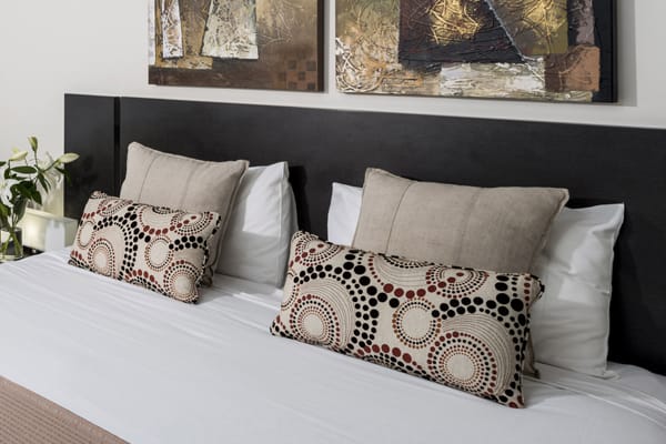 queen size bed with comfortable pillows at Oaks Aspire hotel Ipswich, Queensland