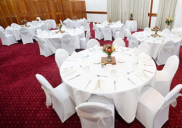 table setting in large indoor wedding venue for hire in Gladstone near airport