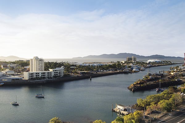 View of Ross Creek and Reef HQ from hotel room balcony at Oaks Metropole Hotel in Townsville
