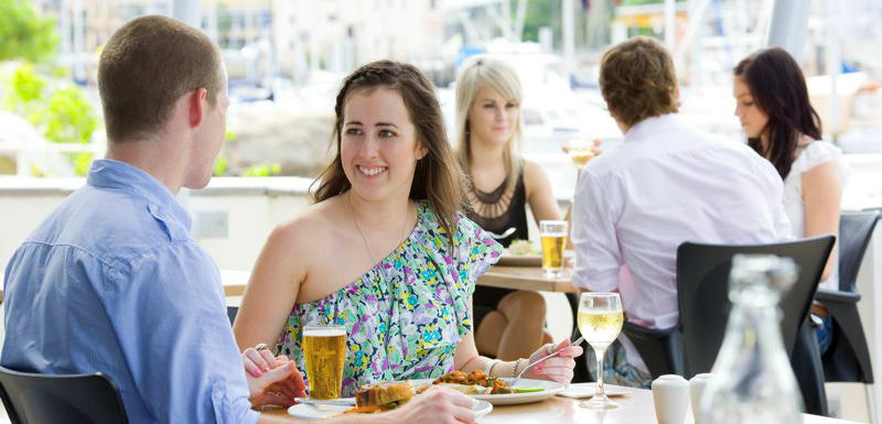 couple on romantic trip enjoying breakfast at Metropole Hotel restaurant in Townsville