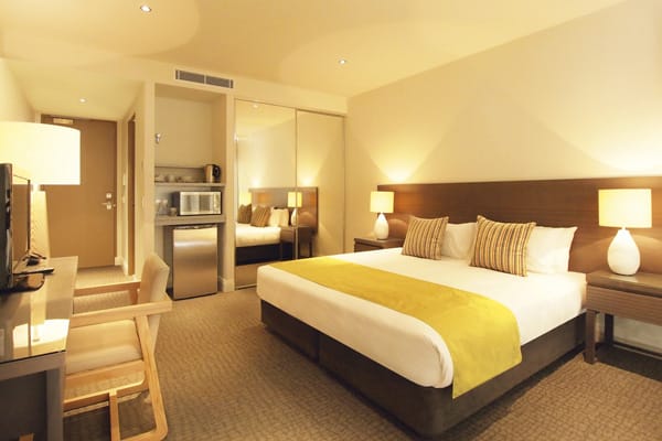 large air conditioned bedroom in hotel room at Mon Komo Hotel in Redcliffe, Queensland, Australia
