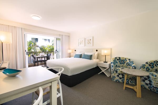 air conditioned bedroom with big, comfortable, bed in 2 bedroom dual key apartment at Oaks Oasis Resort hotel in Caloundra, Sunshine Coast