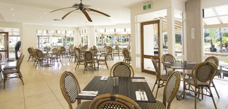 dining room with tables, chairs, air con and ceiling fans at famous Reflections Restaurant and Bar in Caloundra on Sunshine Coast, Queensland, Australia