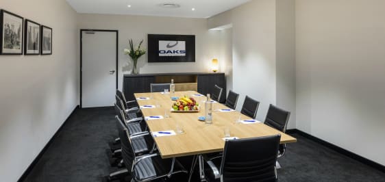 Oaks Embassy Adelaide conferencing room 2 with boardroom setup, air conditioning and Wi-Fi access