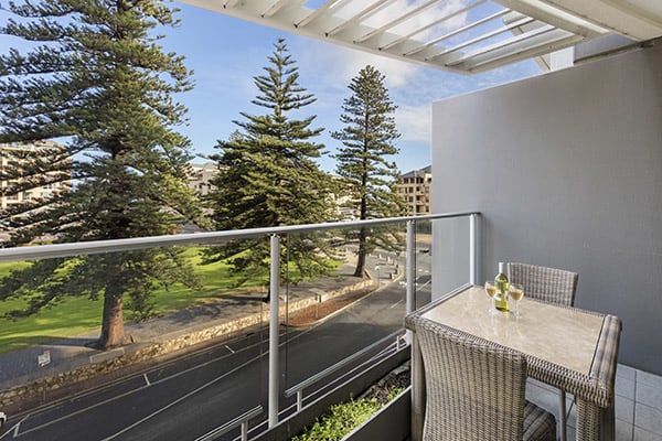 vegetarian meal option on table on private balcony of 2 bedroom apartment at Oaks Liberty Towers hotel in Glenelg, South Australia