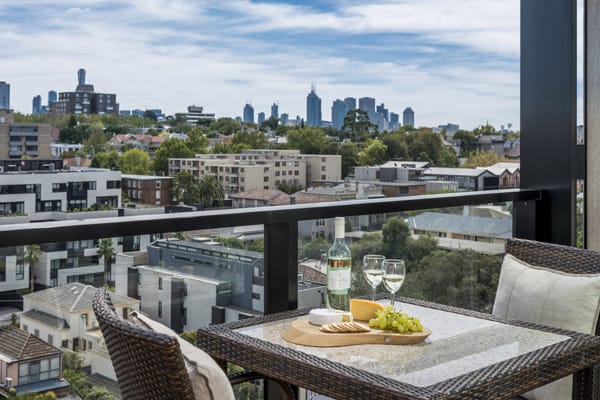 Affordable hotels in Victoria with private balcony at South Yarra accommodation with views of Melbourne city below at Oaks South Yarra hotel