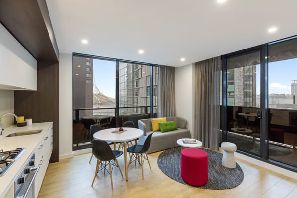 Hotels Southbank Melbourne with large living room with modern furniture in big 2 Bedroom Apartment with private balcony at Oaks Southbank hotel in Melbourne city, Victoria, Australia