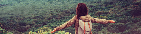 Young Australian traveler with backpack looking at Melbourne bush and forest near Oaks Southbank hotel