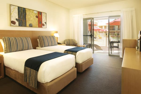 two single beds in air conditioned Studio Apartment with free Wi-Fi at Oaks Broome hotel, Western Australia