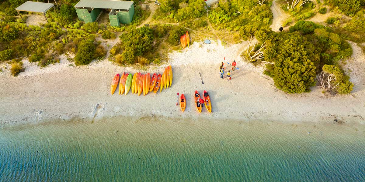 A breathtaking view of the Kangaroo Island with colorful boats parked by the shoreline
