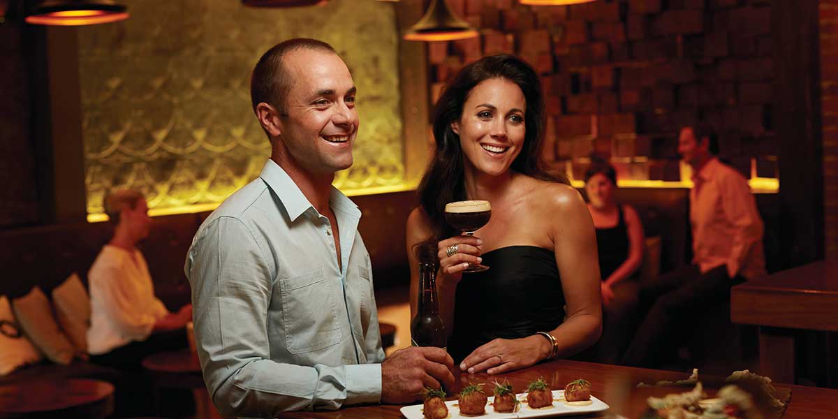 Couple enjoying their wines in The Dispensary at the downtown of Mackay