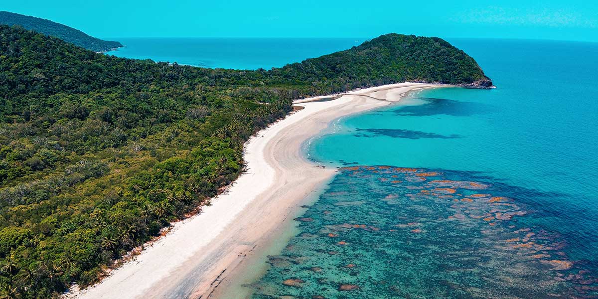Lush green Daintree Cape Tribulation with scenic views of blue waters of the sea