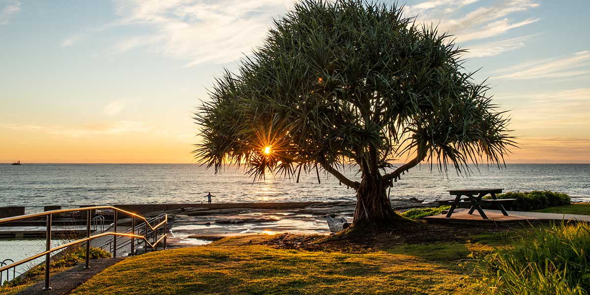 The charming coastal town of Yamba Beach with overlooking sunset view