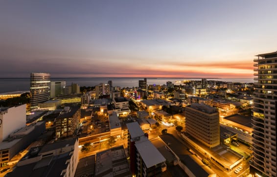 Best hotel Darwin has near airport with beach at sunset in background overlooking harbour aerial view during summer holidays